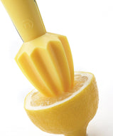 Citrus squeezer with knife and zester